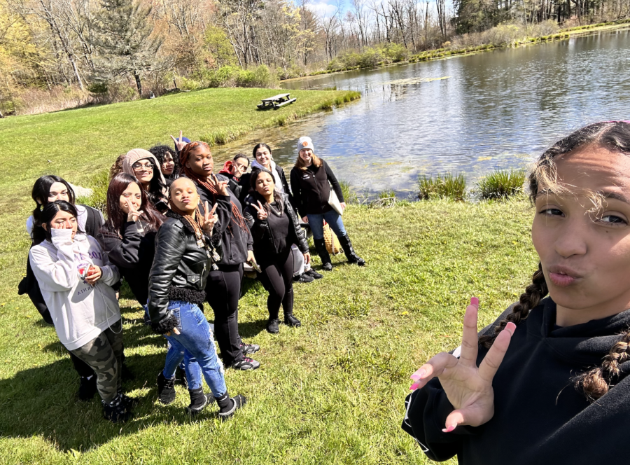 ACE+Students+and+instructor+Carrie+pictured+by+the+pond+at+White+Memorial+Conservation+Center
