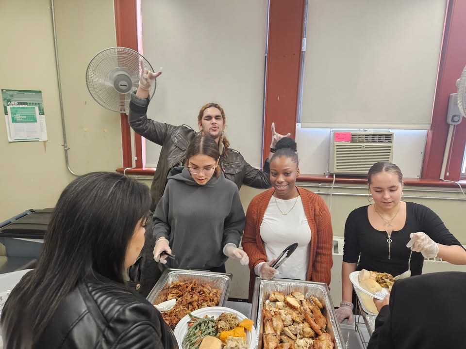 Former student Randy Espinal joins Jaelyn Perez, Aria Lyons and Valentina Civitano to serve our guests.