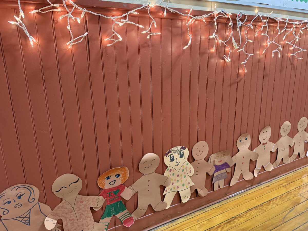 Gingerbread people lead the way to Santa in preparation for Breakfast with Santa.