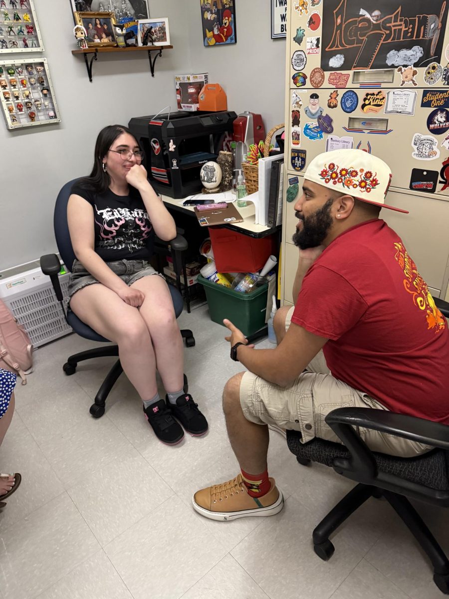 DJ meets with a student to talk about school and how she feels. DJ’S office is open to anyone who wants to talk or to figure things out.
