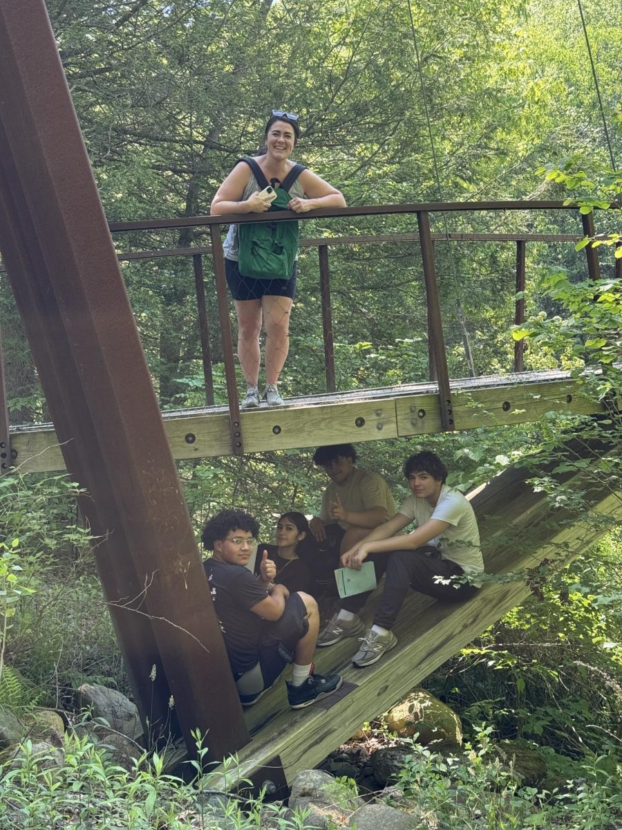 Students find a cozy place to relax and write poetry after the hike.