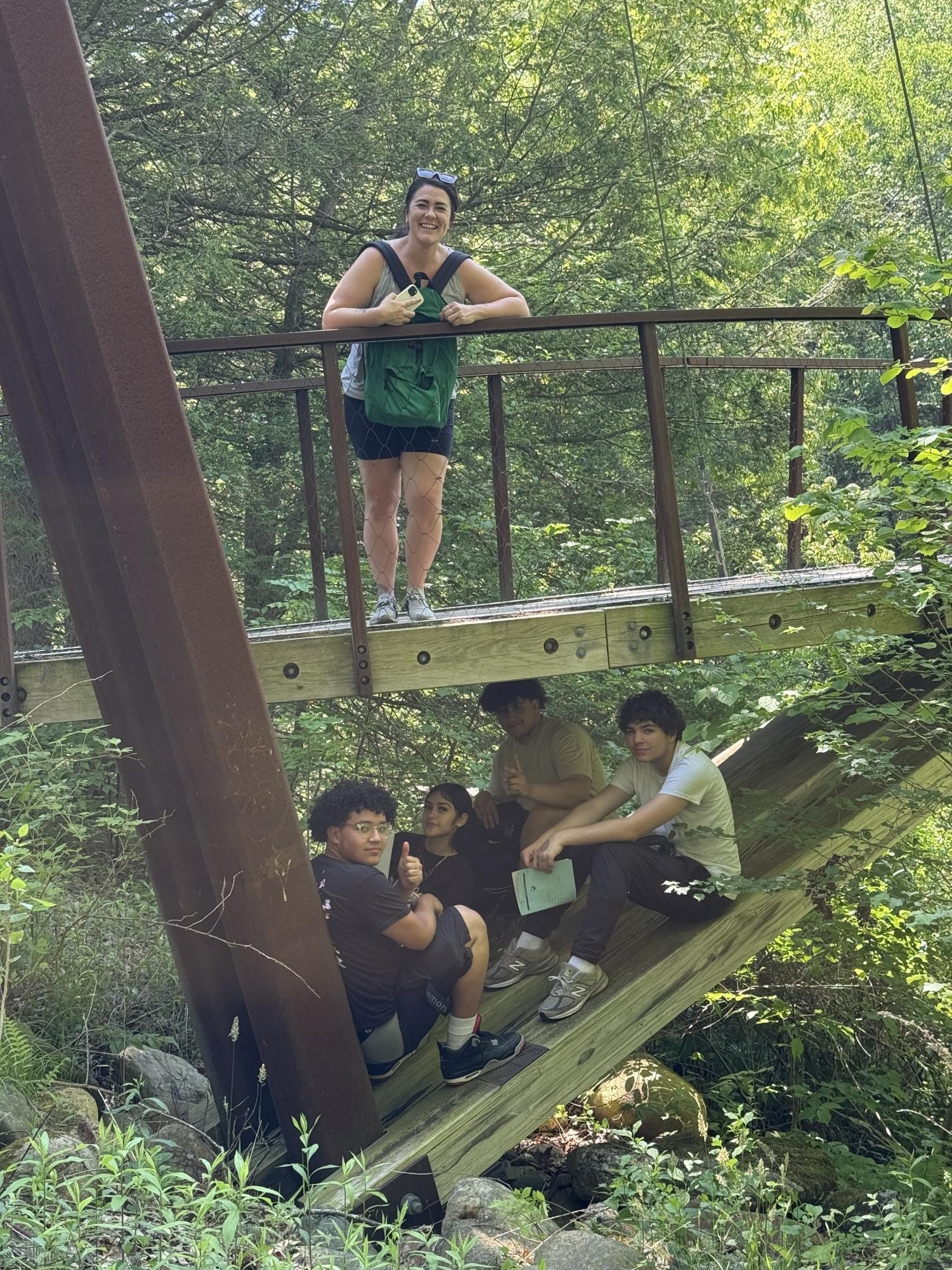 Students find a cozy place to relax and write poetry after the hike.